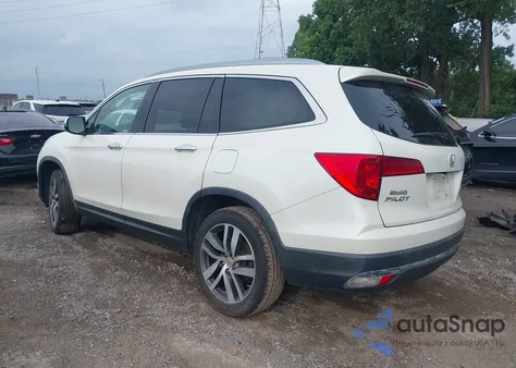 2018 Honda Pilot Touring из США, поврежденный, VIN 5FNYF6H99JB056304